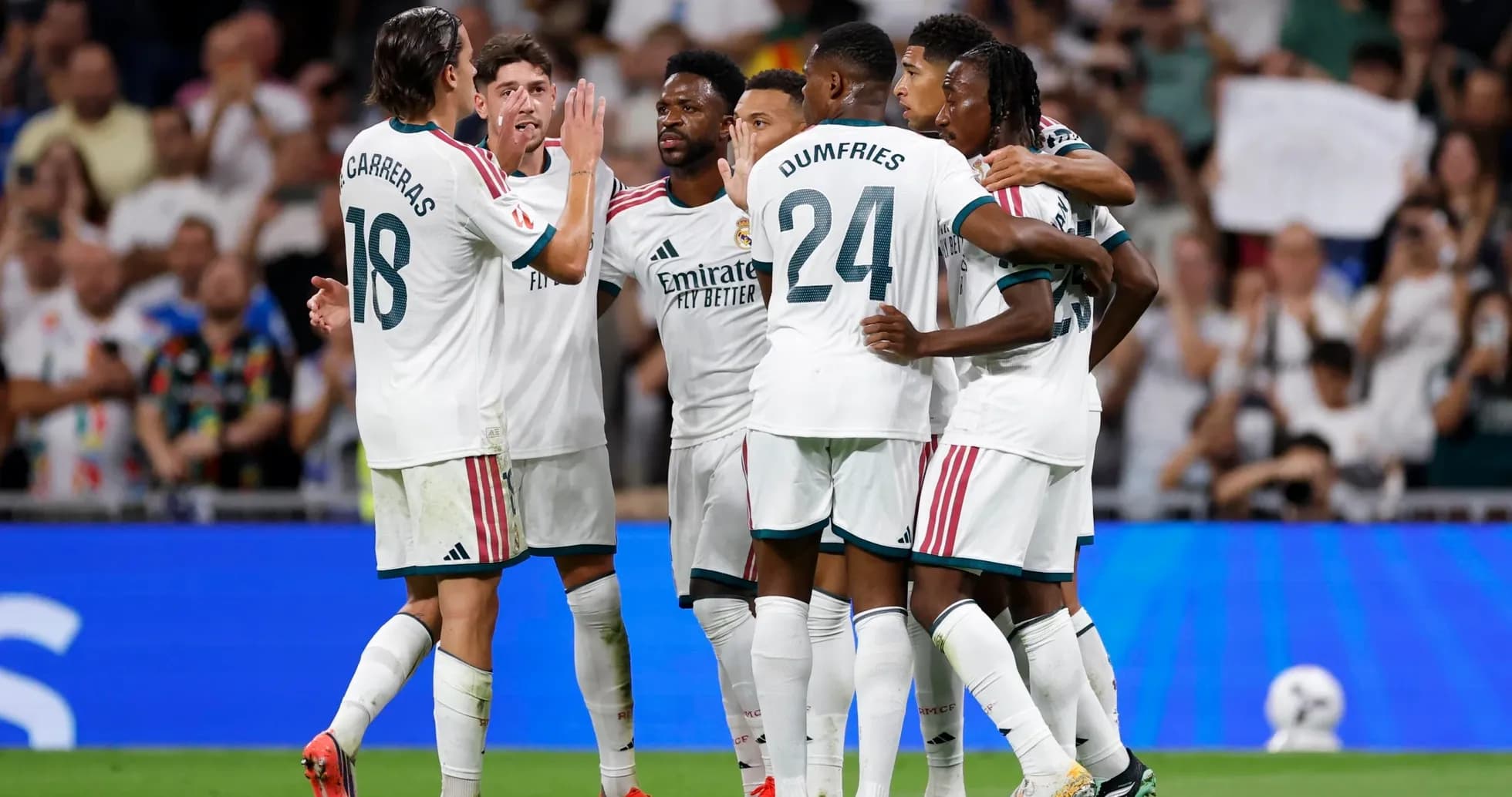 Real Madrid players celebrating a goal