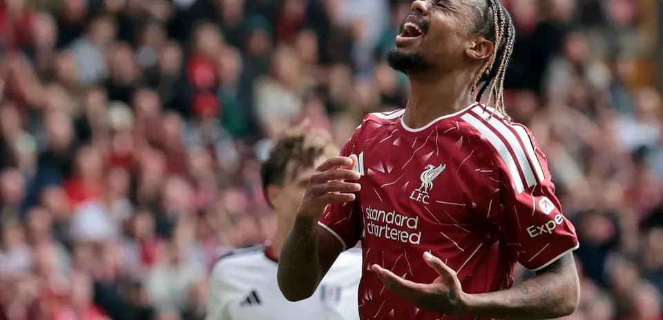 Liverpool player reacting during match against Fulham
