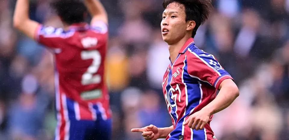 Player celebrating after scoring a goal during match