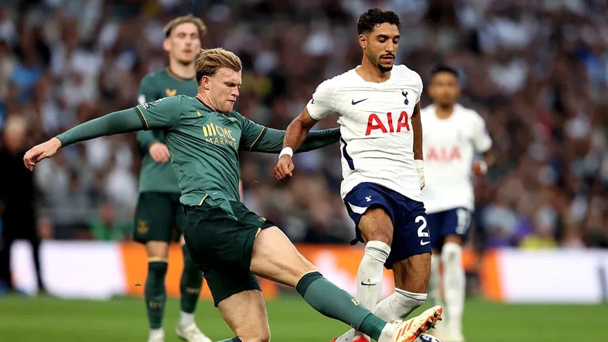 Player from Tottenham evading tackle during match