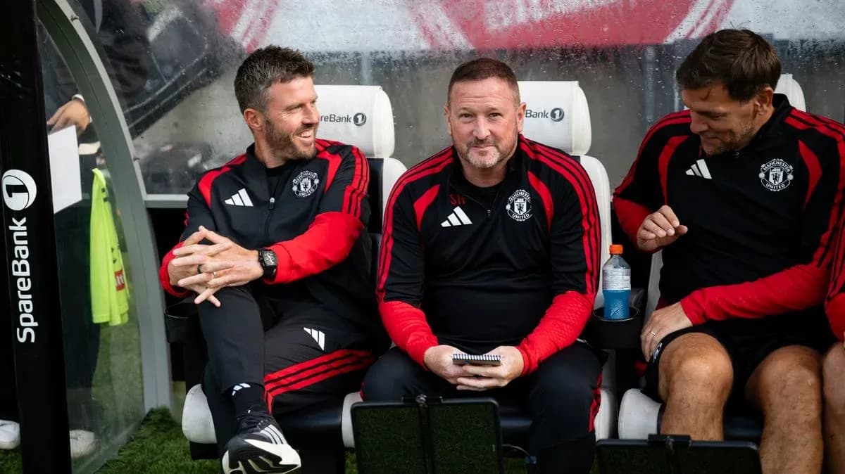 Coaching staff sitting on bench during match Coaching staff sitting on bench during match
