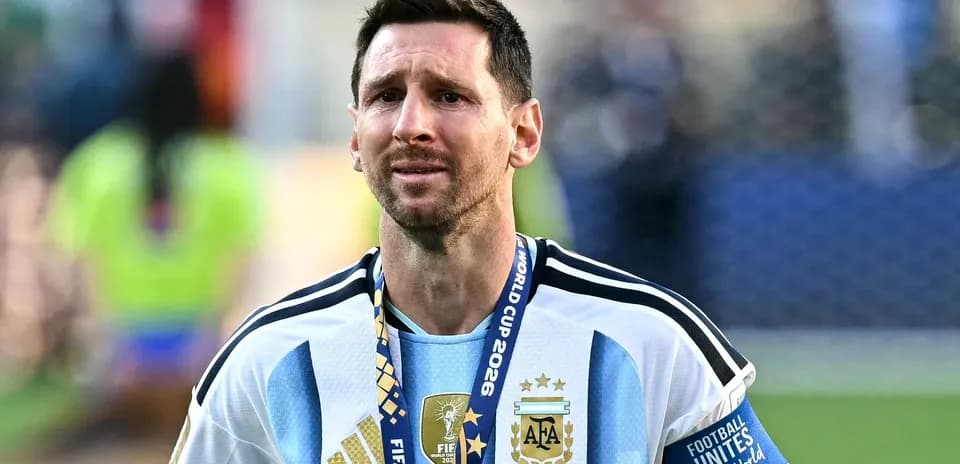Player wearing Argentina jersey with World Cup medal