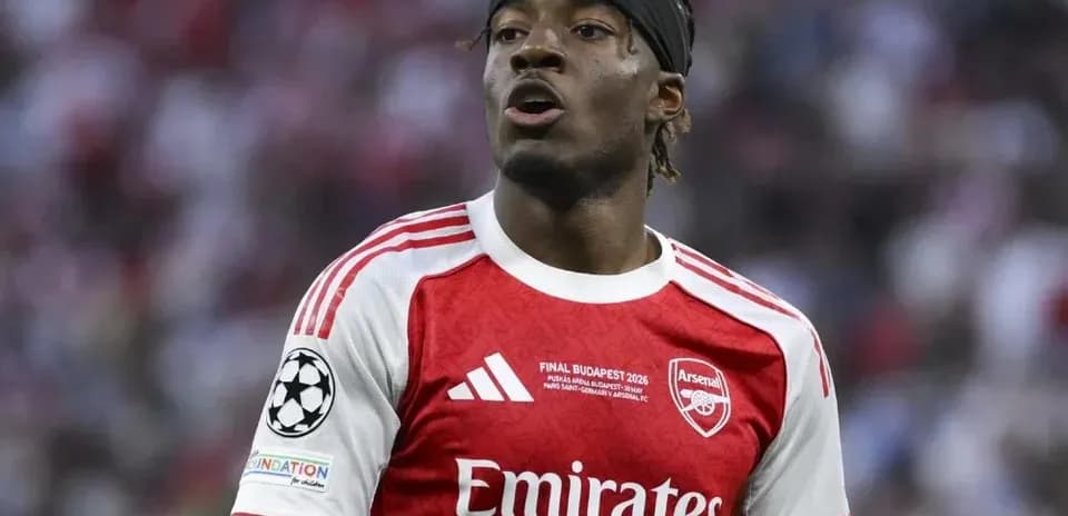Arsenal player wearing red jersey during match