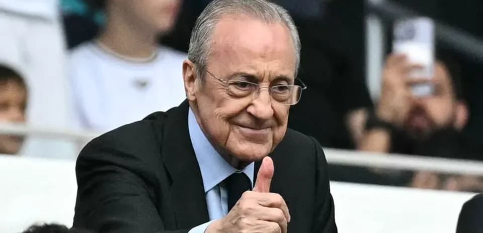 Man giving thumbs up in a stadium