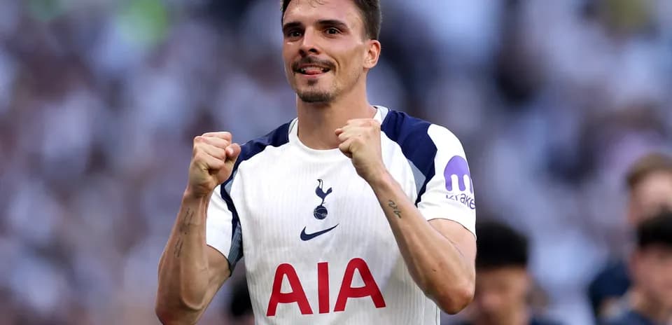 Tottenham player celebrating after scoring a goal