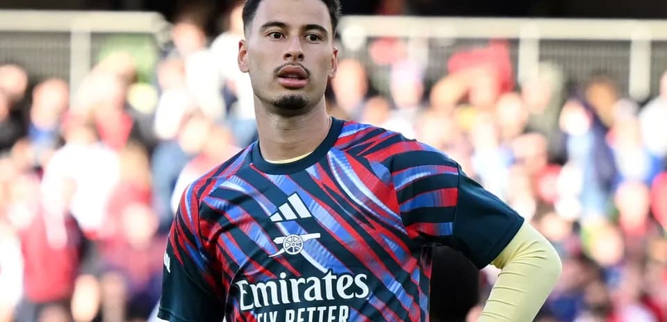 Goalkeeper in colorful training kit during match