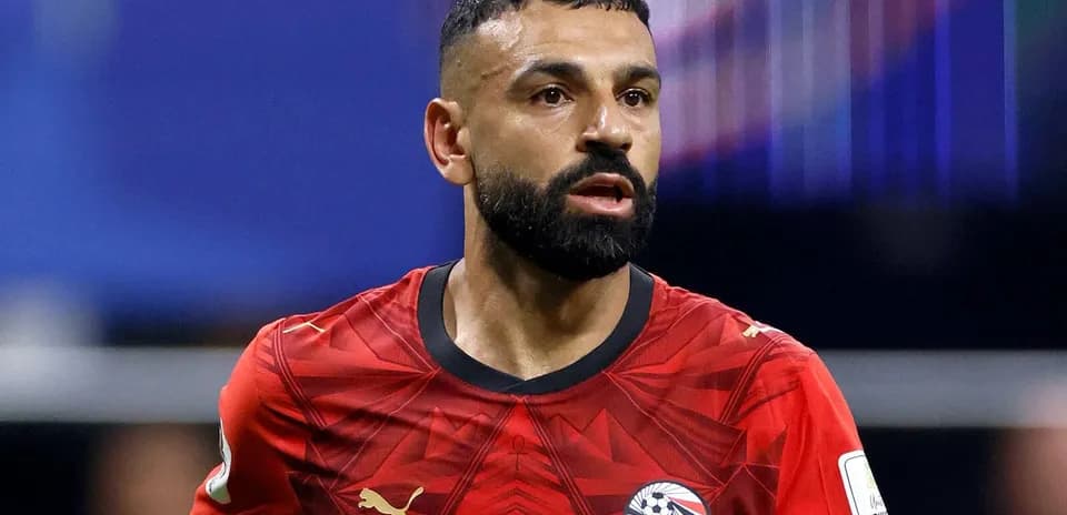 Player in red jersey during football match