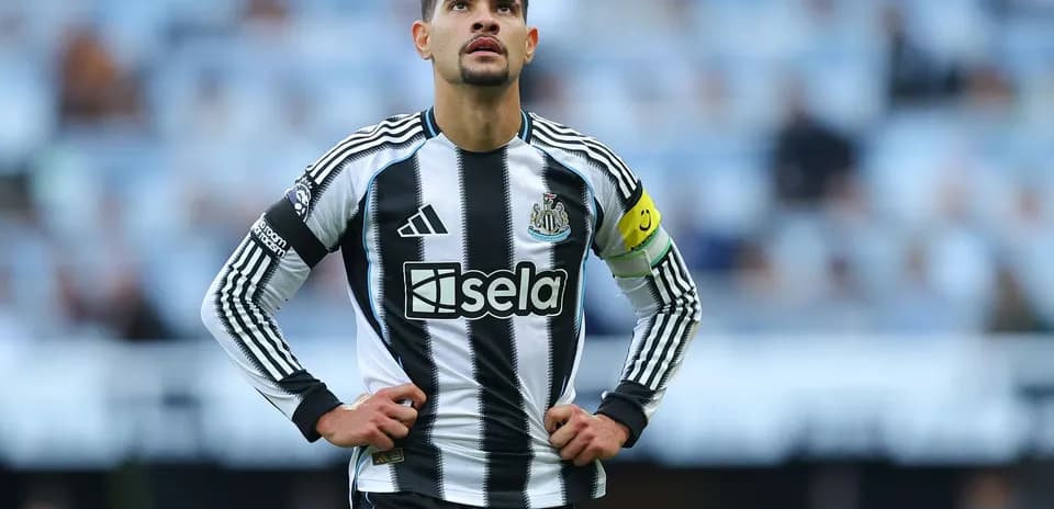 Newcastle player looking up on the pitch
