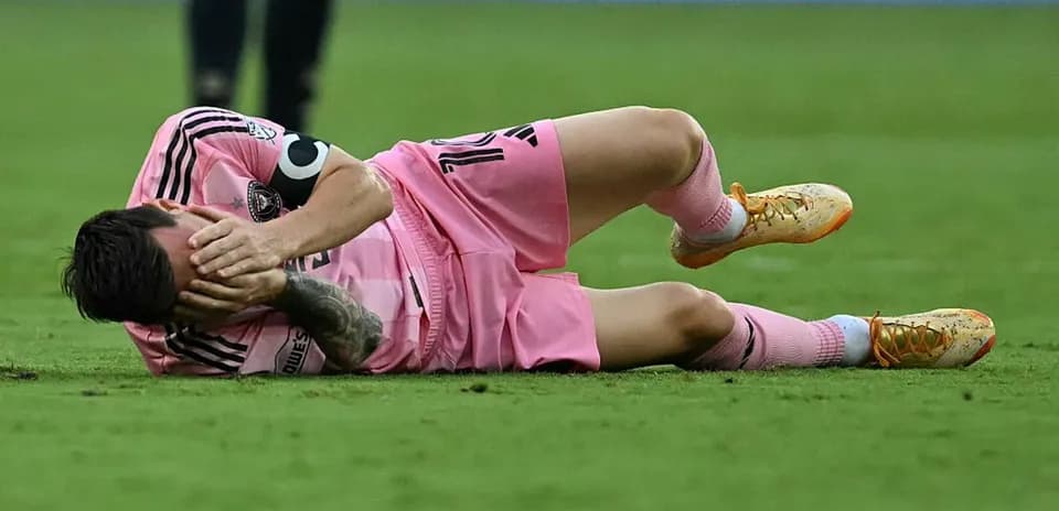 Player lying on the ground in pain during match