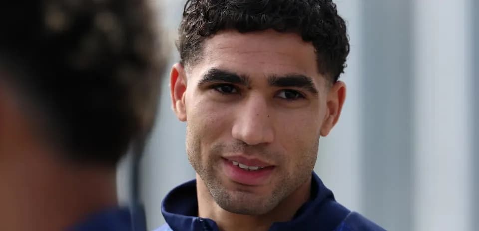 Football player smiling during training session