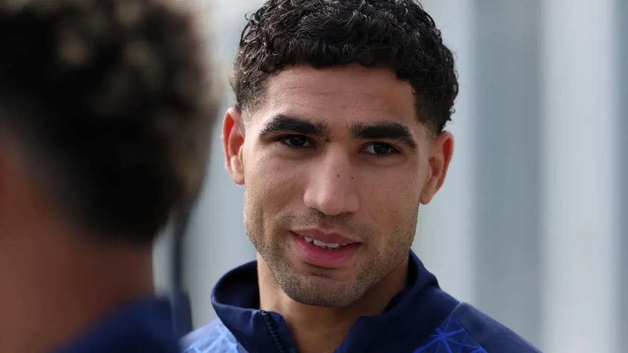 Football player smiling during training session