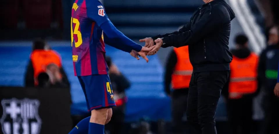 Player receiving instructions from coach during match