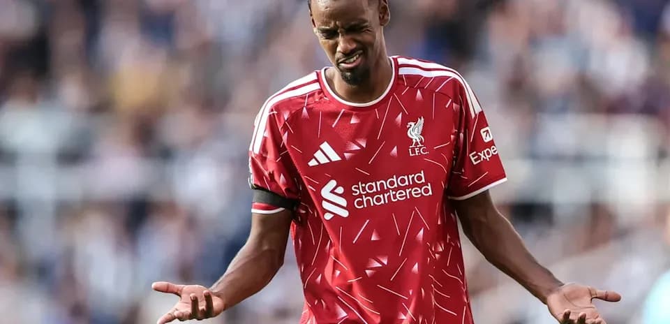 Liverpool player reacting during match with frustration