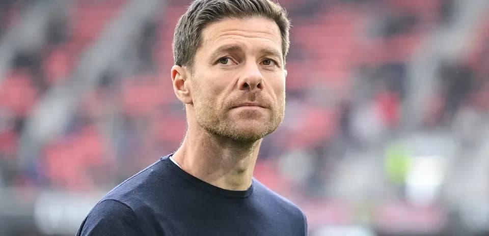 Coach observing from the sidelines before the match