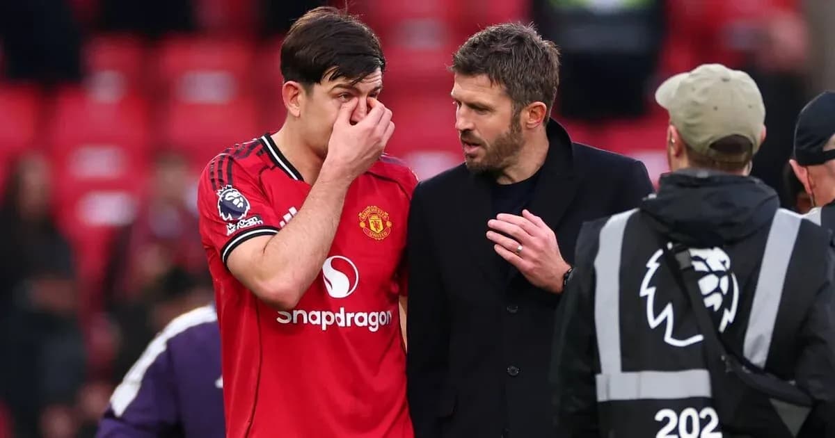 Player discussing with coach after match