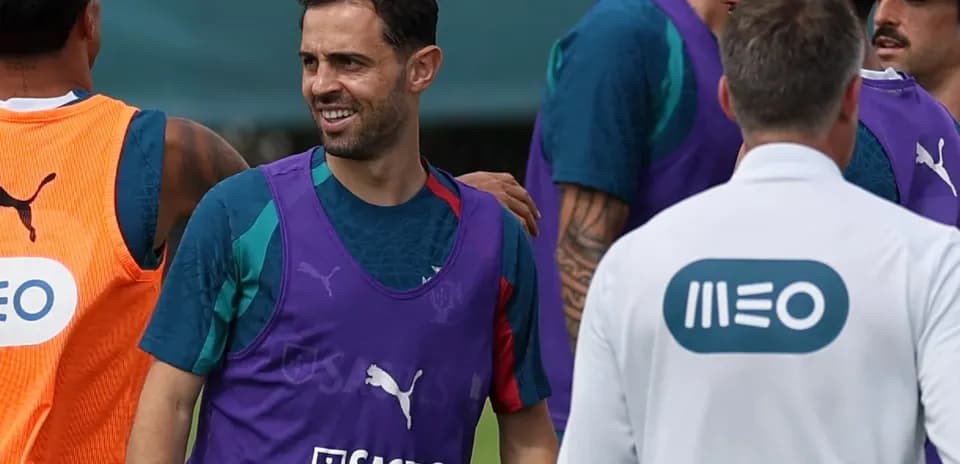 Players interacting during training session on pitch