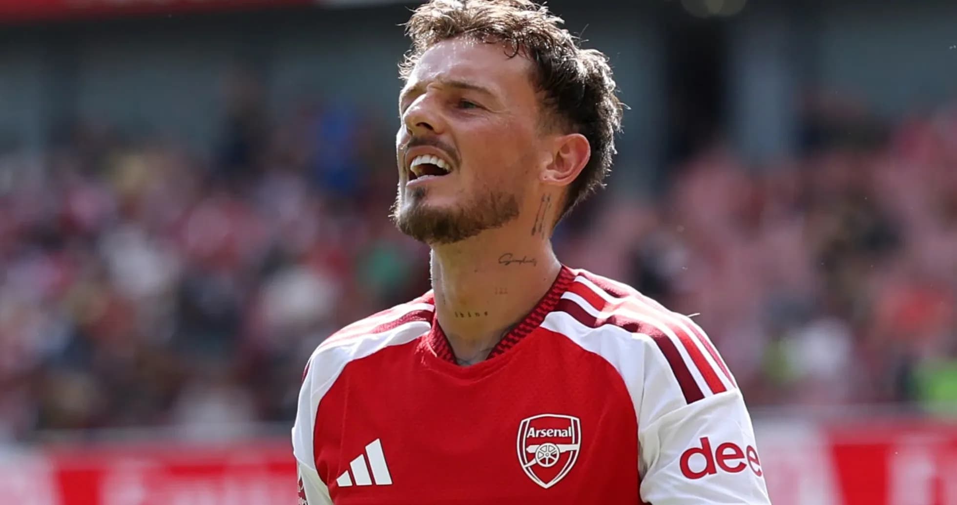 Player in Arsenal jersey during match action