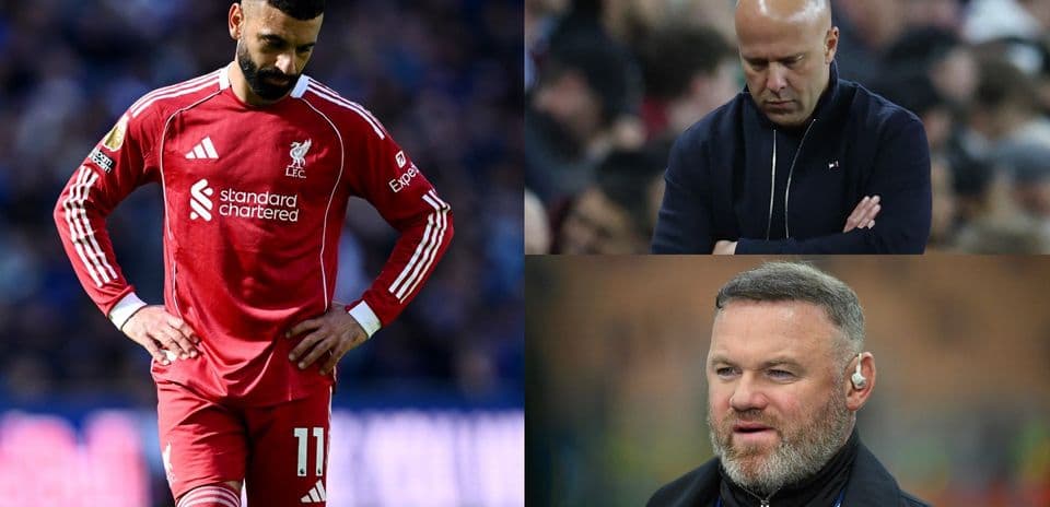 Liverpool player looking dejected with coaches observing