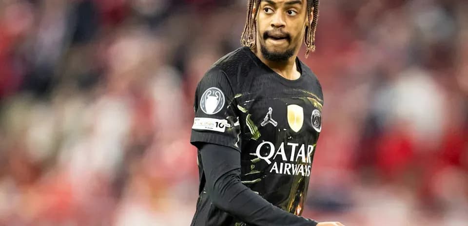 Player wearing black jersey during match action
