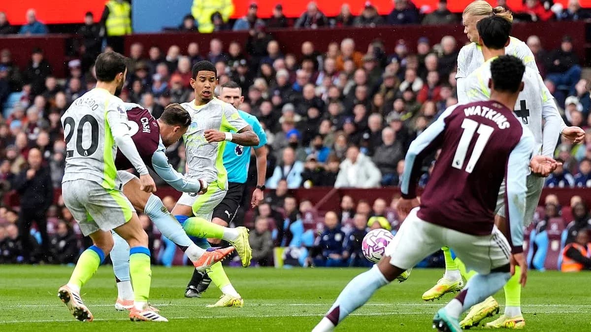 Manchester City player shooting against Aston Villa