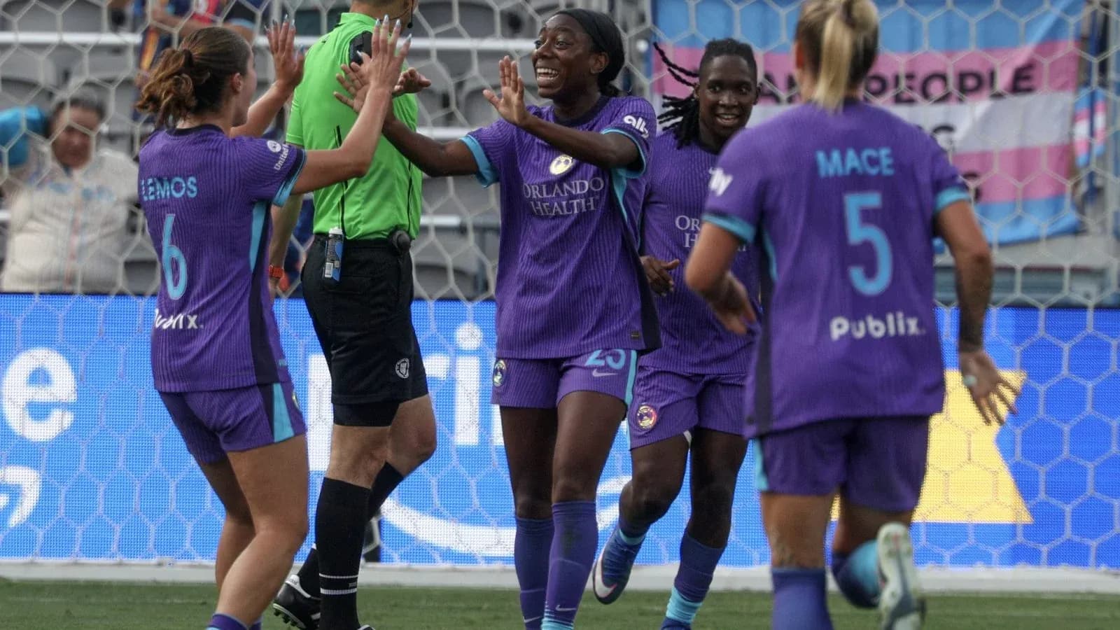 Orlando Pride players celebrating a goal