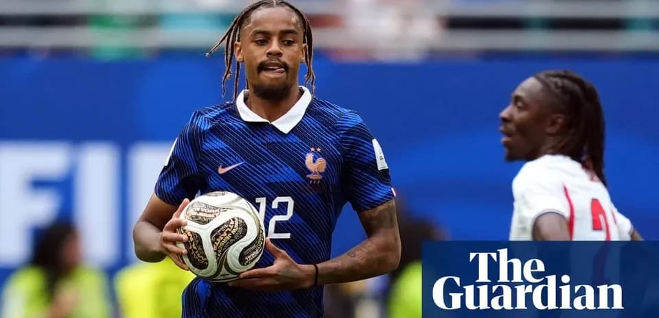 Player in blue France kit holding soccer ball
