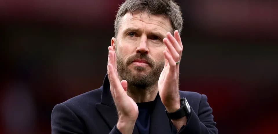 Coach applauding supporters after the match