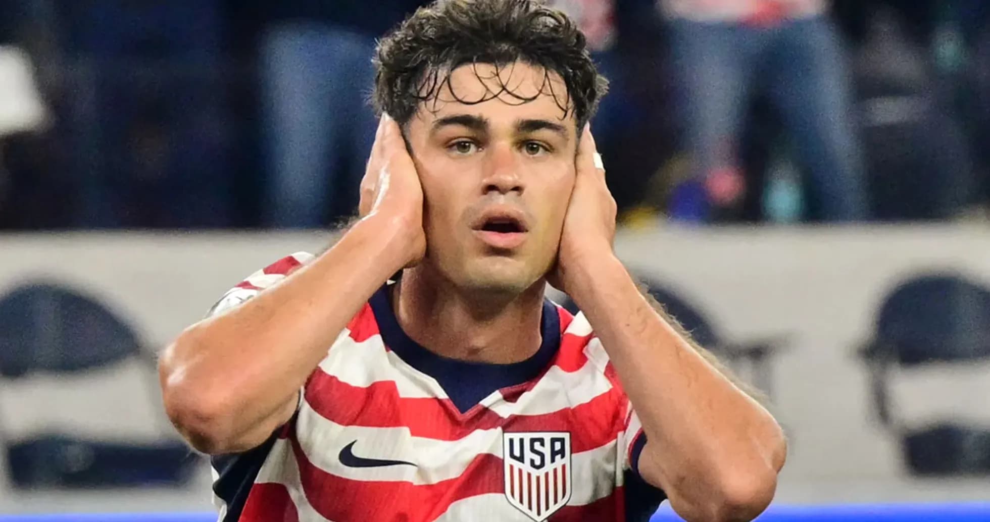 Player holding his head in frustration on field