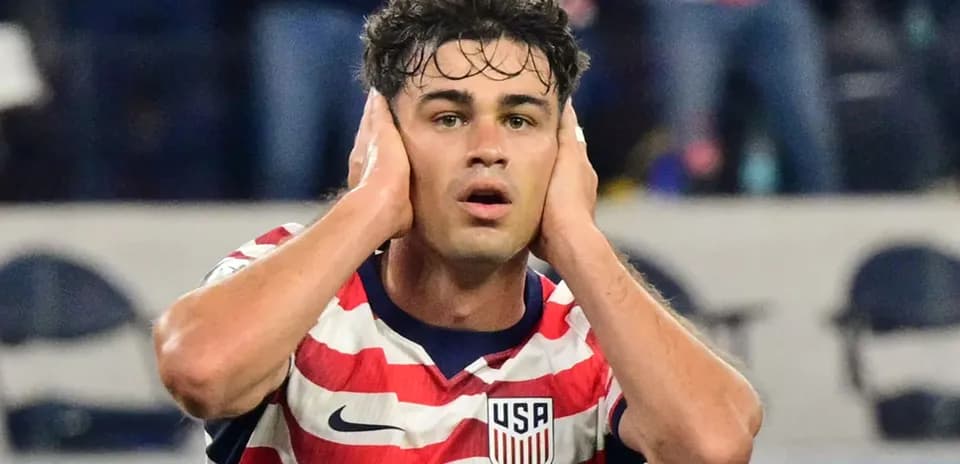 Player holding his head in frustration on field