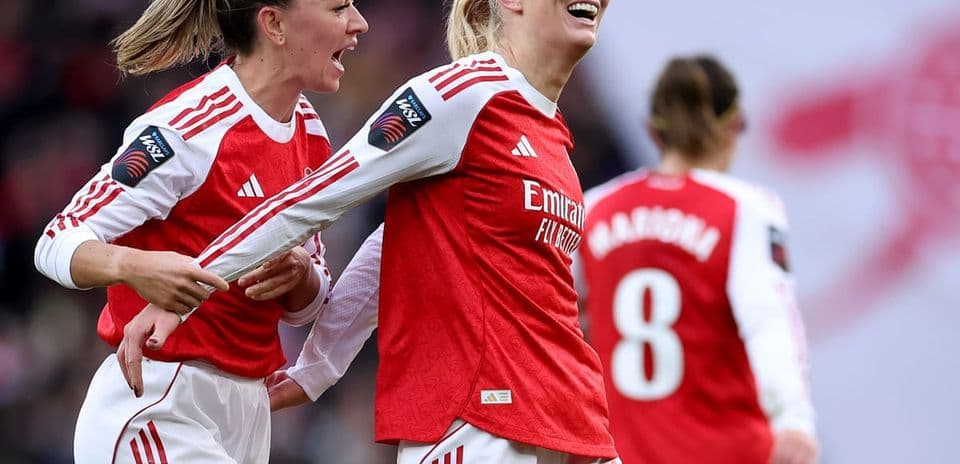 Arsenal W players celebrating a goal