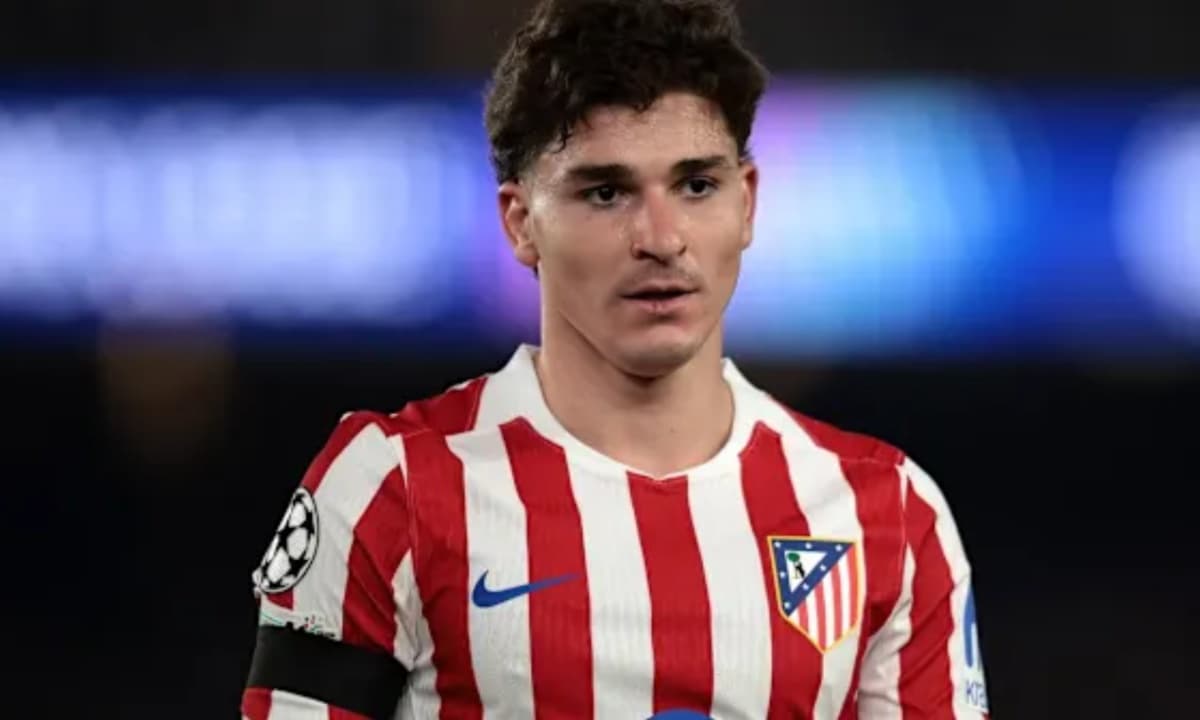 Atletico Madrid player in red and white jersey