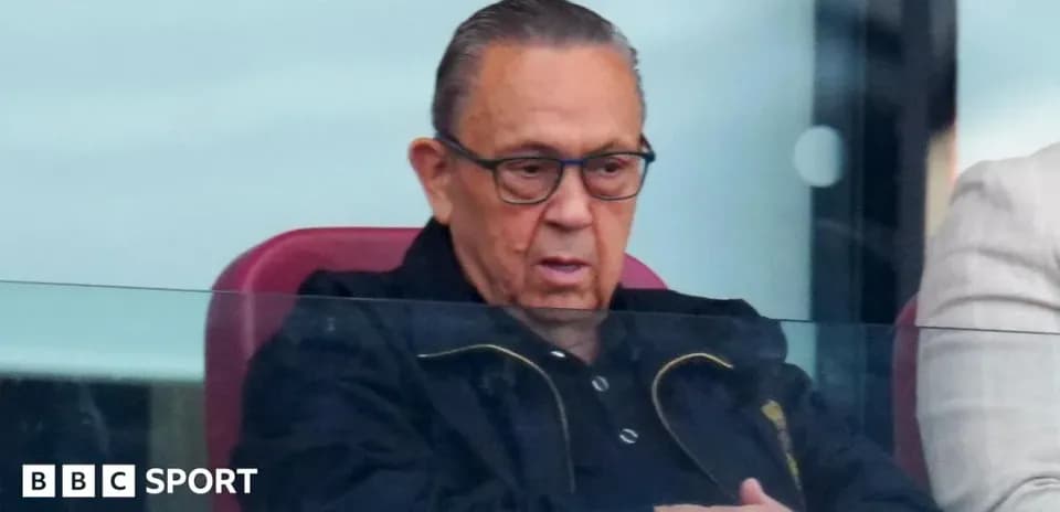 Man observing a match from a VIP box