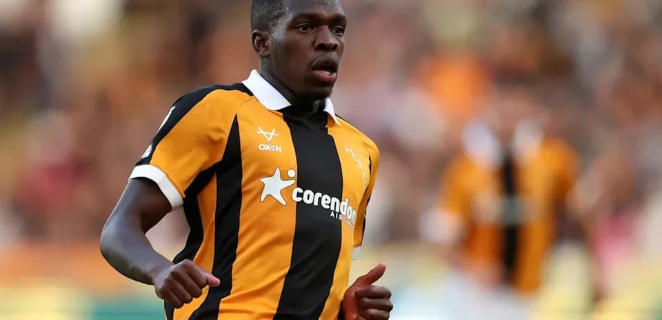Player running on the field in team uniform