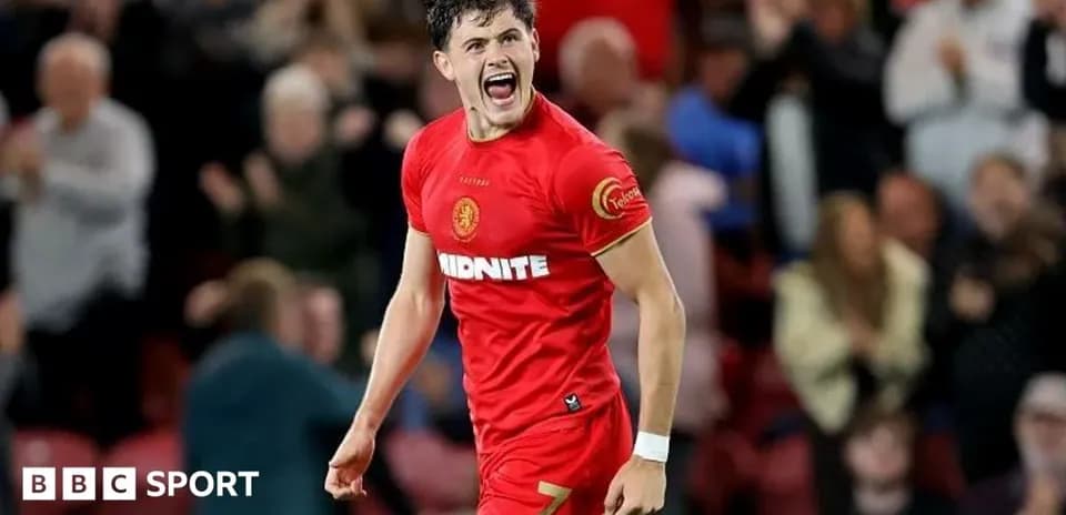 Player celebrating after scoring a goal during match