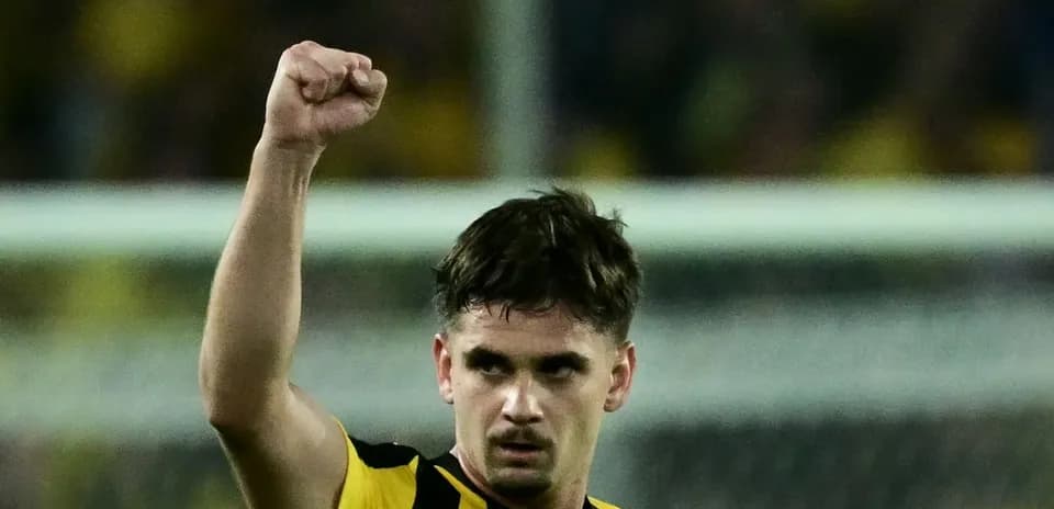 AEK Athens player celebrating after scoring