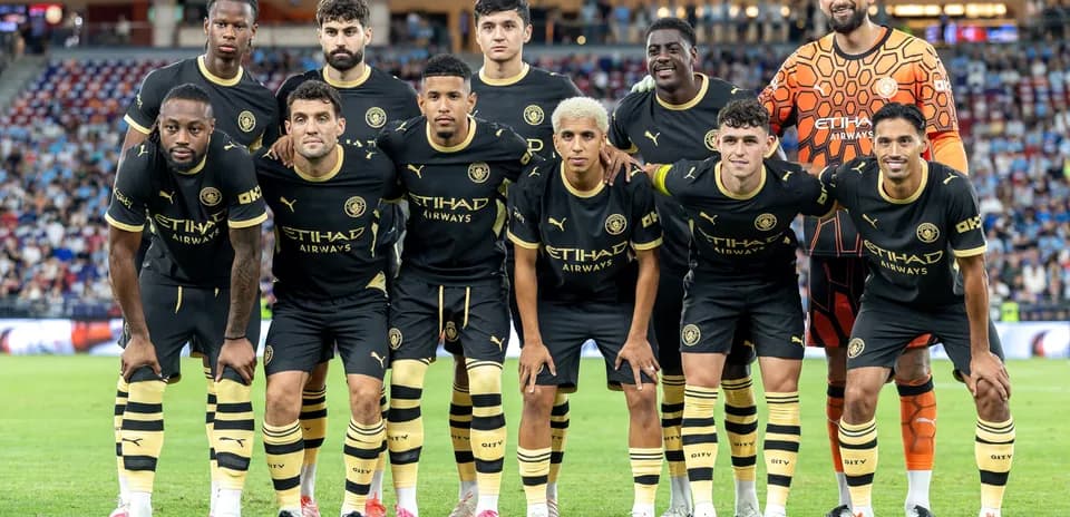 Football team posing for group photo before match
