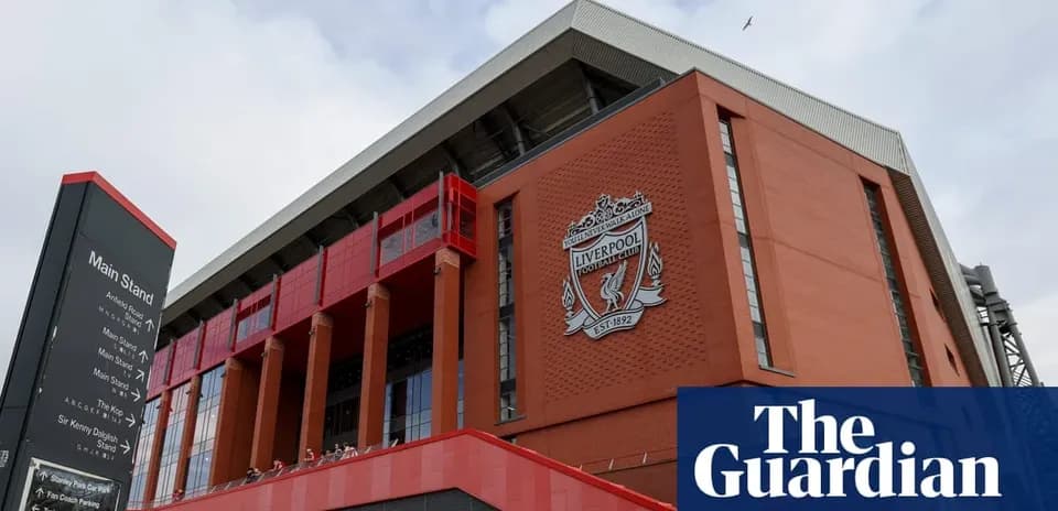 Exterior view of Anfield stadium with Liverpool FC crest