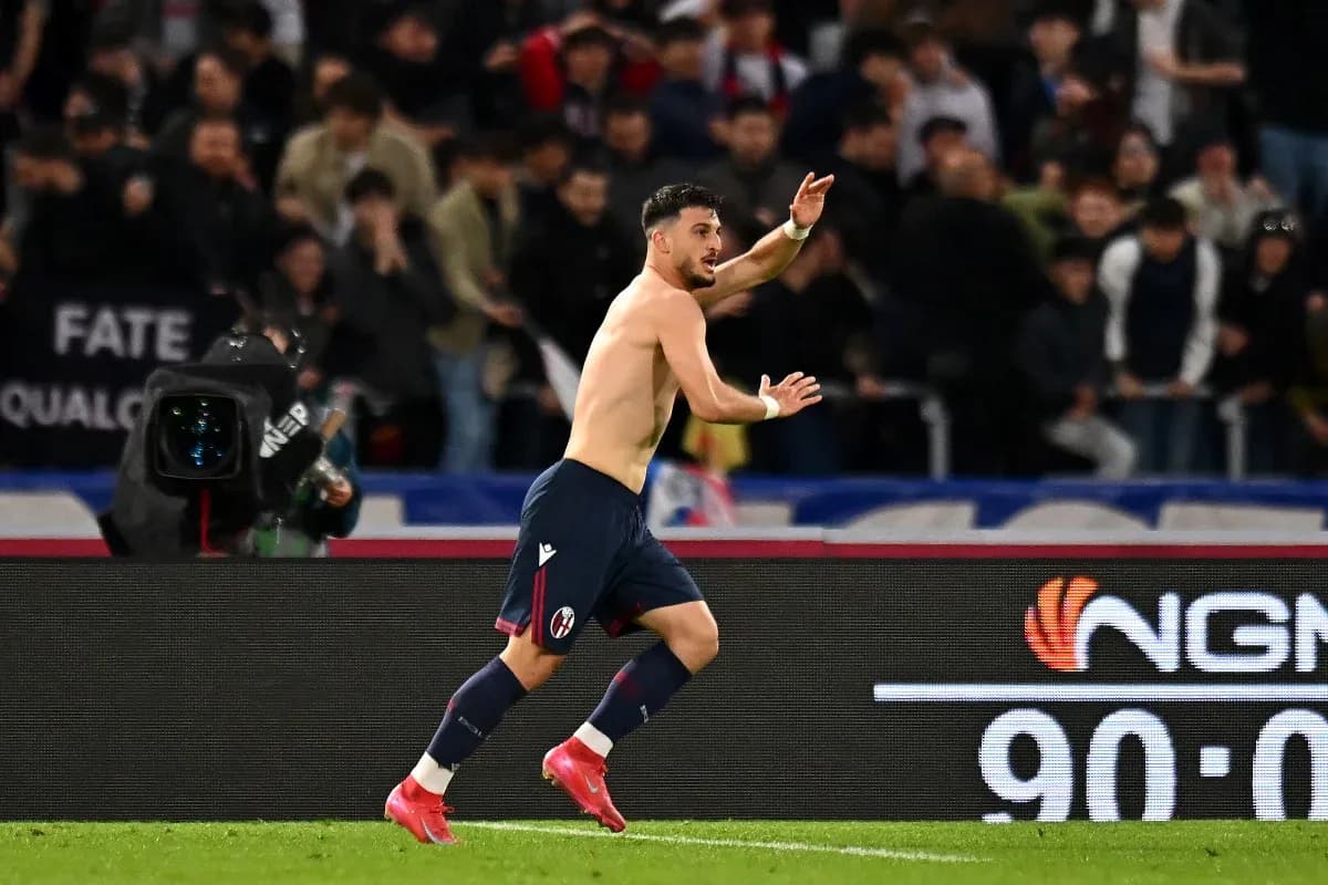 Bologna player celebrating after scoring a goal