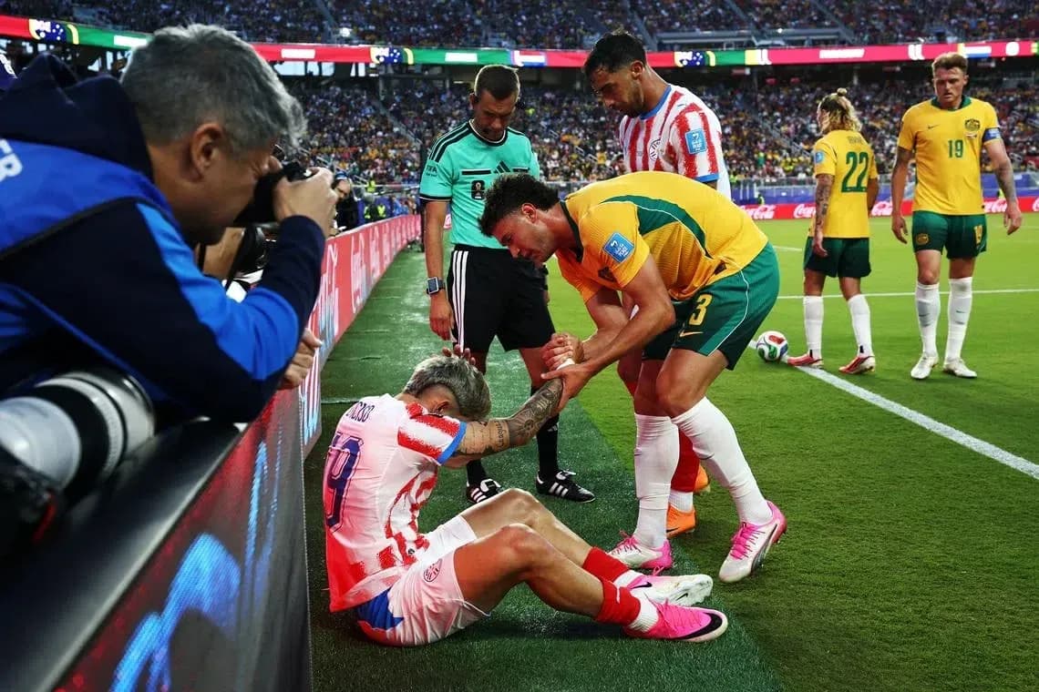 Player receiving assistance on the sidelines during match
