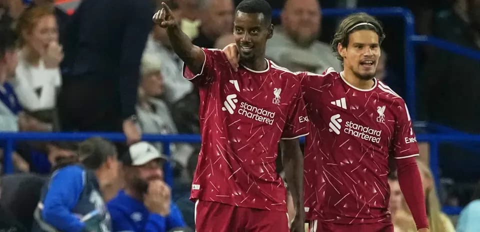 Liverpool players celebrating a goal together
