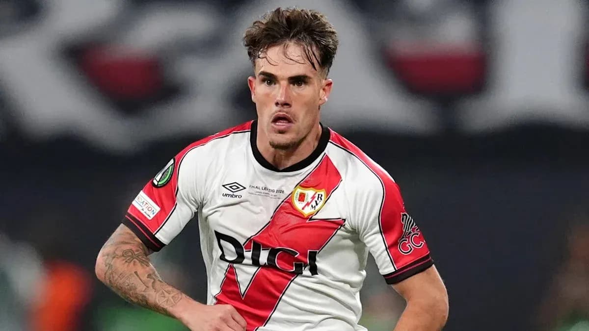 Player in Rayo Vallecano kit running during match