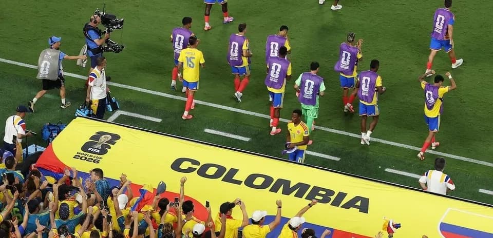 Colombia team celebrating with fans during match