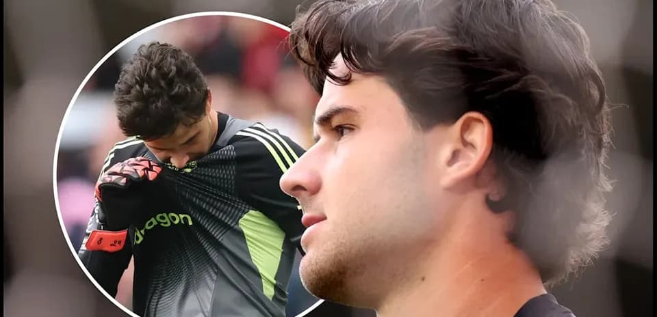 Goalkeeper preparing for match with focused expression