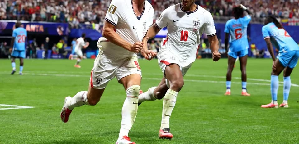 England players celebrating a goal during match