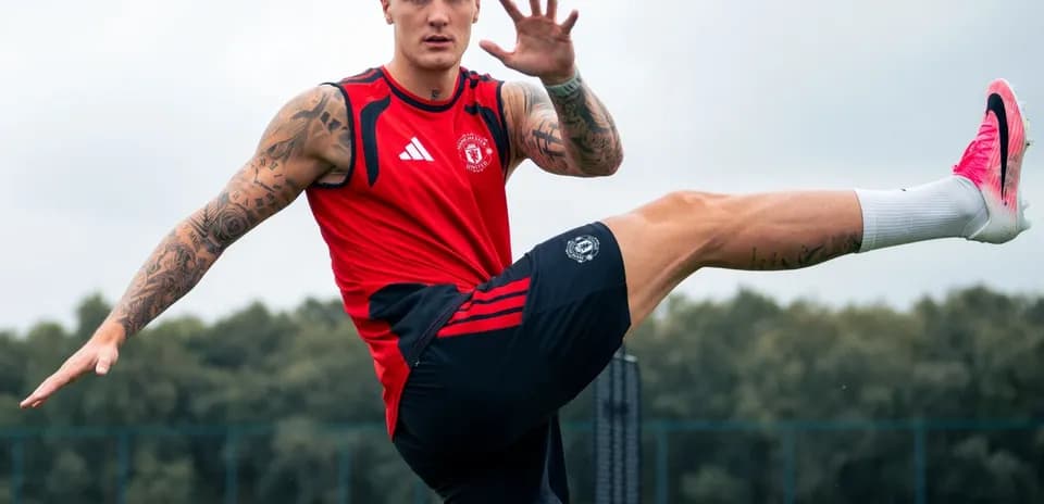 Player training with high kick on practice field