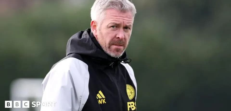 Coach observing during training session outdoors
