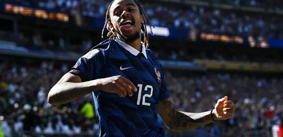 Player celebrating during match wearing France jersey