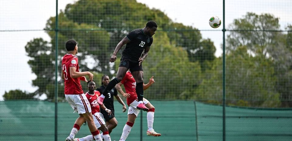 Player jumping to head the ball during training