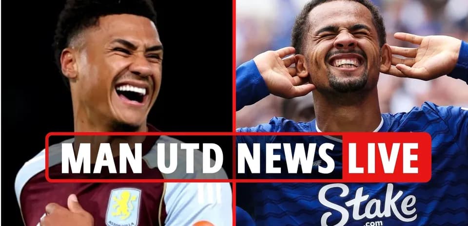 Two football players smiling and celebrating