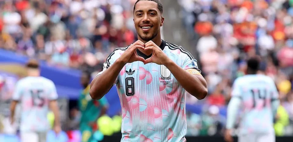 Player celebrating and making heart shape gesture